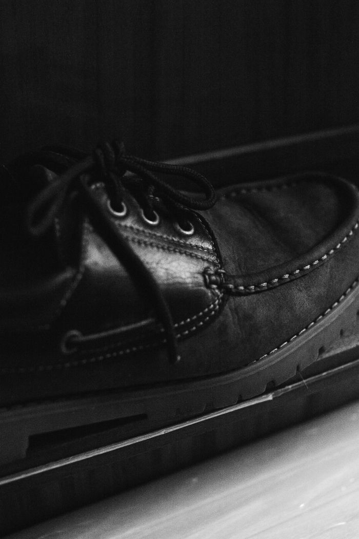Close study of a black leather shoe — photo by Nikita Nikitin on Pexels