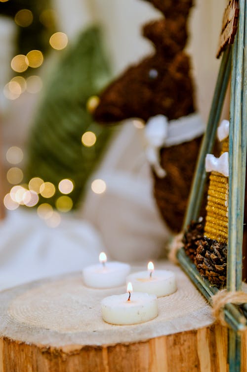 Burning Candles on a Table