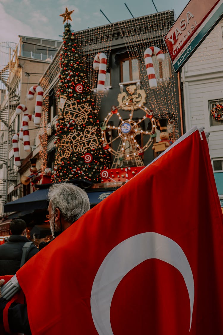 Christmas Decorations On A Store And A Turkish Flag 