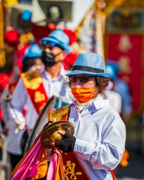 Free Colorful parade in Taiwan featuring performers with cymbals and traditional attire. Stock Photo