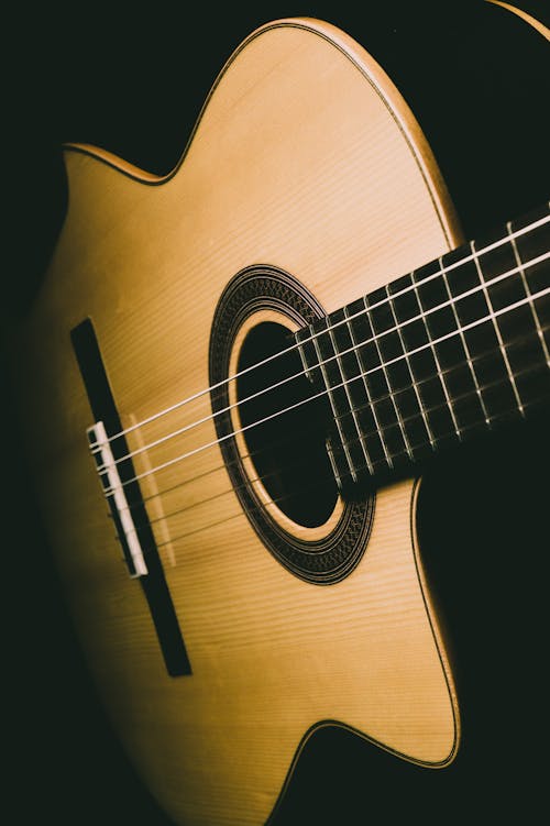 Free Close Up Photo of an Acoustic Guitar Stock Photo