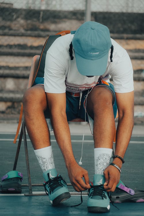 Man Tying his Shoelace