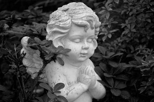 Grayscale Photo of an Angel Statue