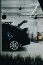A Black Car in a Garage