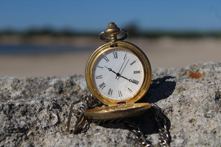 Close Up Of Vintage Clock On Rock