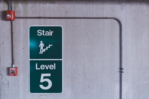 Green and White Stair Level 5 Signage