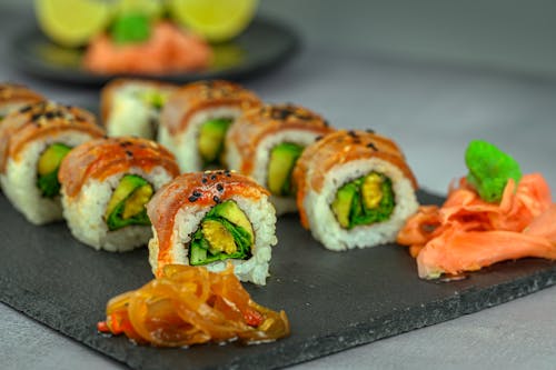 Free Sushi Rolls Served on a Concrete Tray Stock Photo