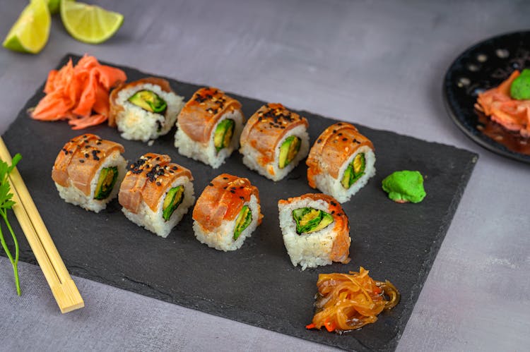 Sushi On Board On Table In Restaurant