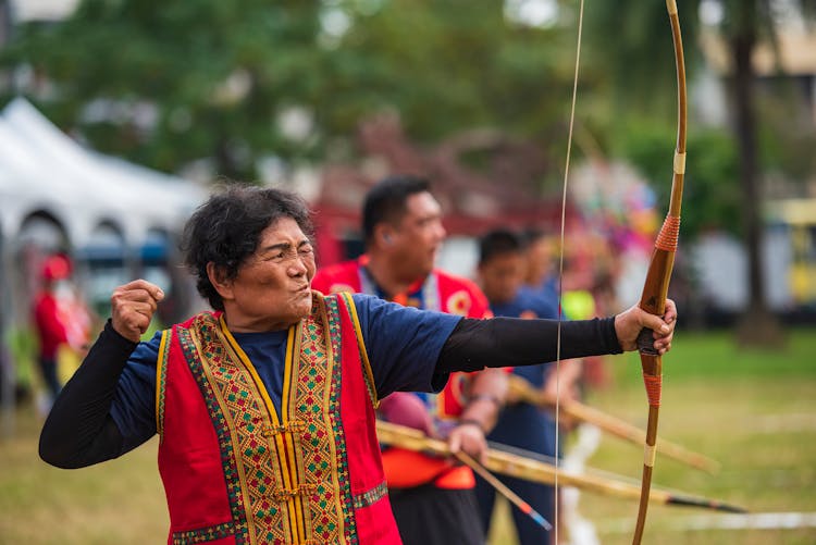 Woman Shooting A Bow 