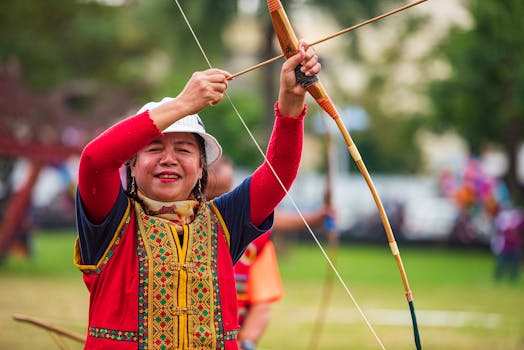 Asian woman skillfully aiming and enjoying traditional archery outdoors in Taiwan.