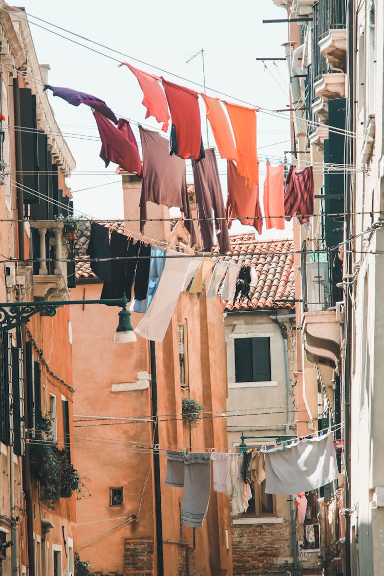 Hanging Clothes In The Alley