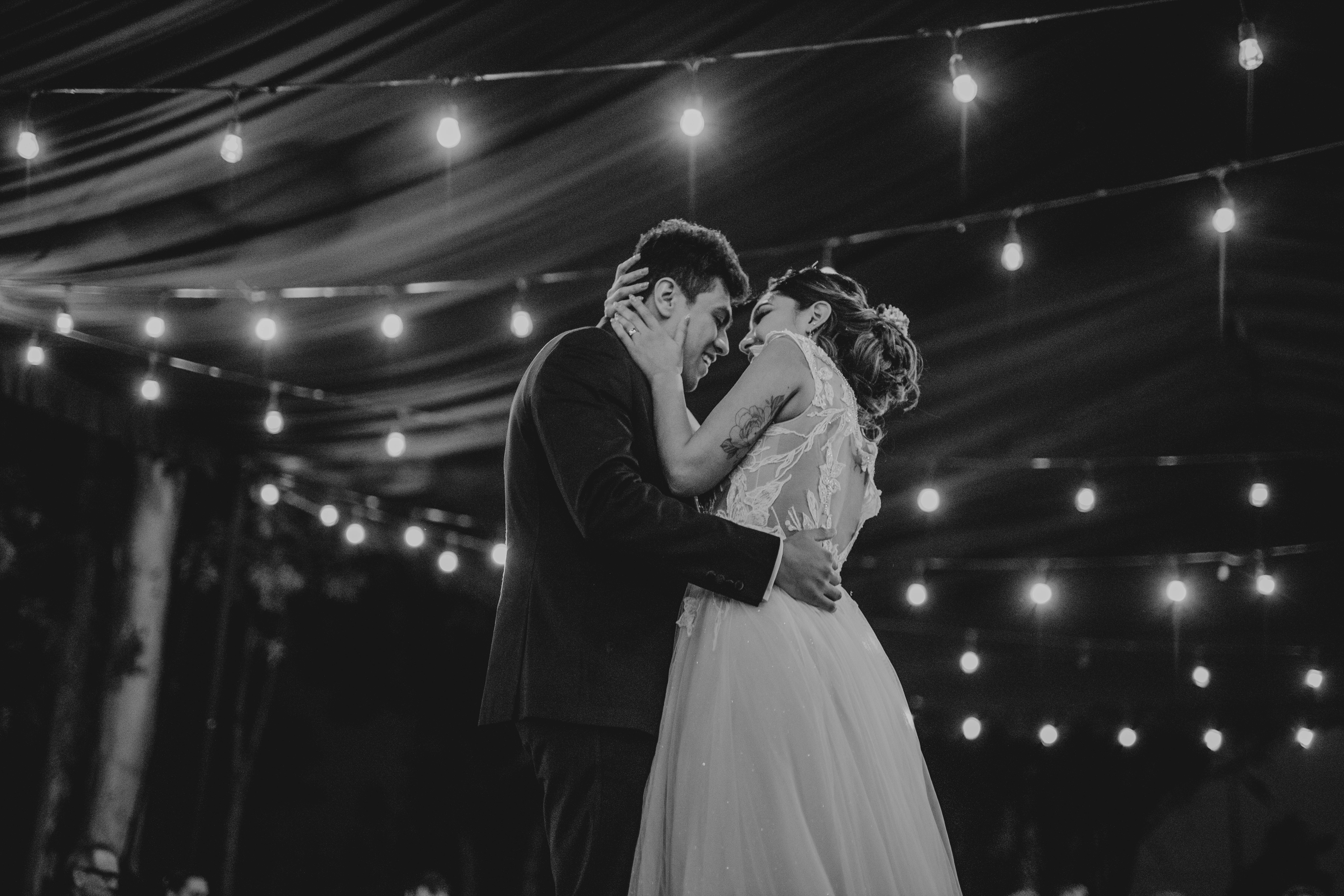Real couple under twinkle lights at a Powhatan venue - powhatan va wedding venues