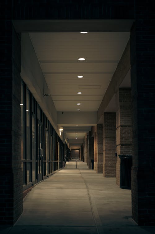 Free Empty Hallway With Lights Turned on Stock Photo