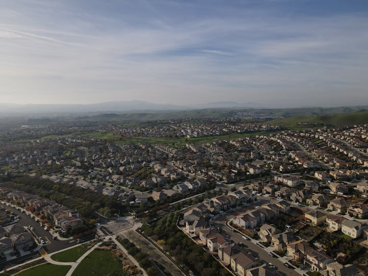 Aerial View Of Middle Class Neighborhood With Identical Residential Houses