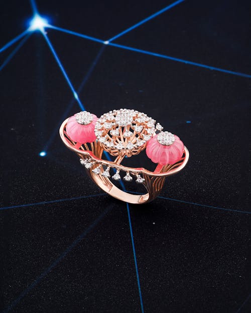 Close-Up Shot of a Pink and Gold Ring