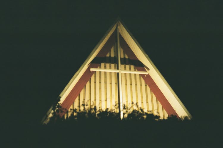 Cross Beside A Roof