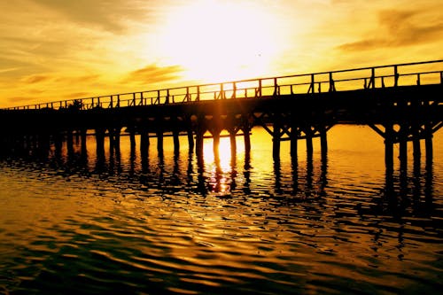 Free stock photo of estuary, old bridge, sunset