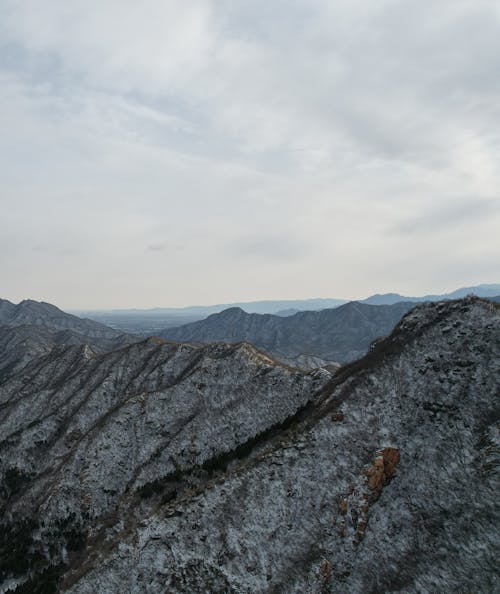 Gratis stockfoto met bergen, bergketen, bewolkt Stockfoto