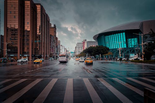 Vehicles on the Road Near Buildings