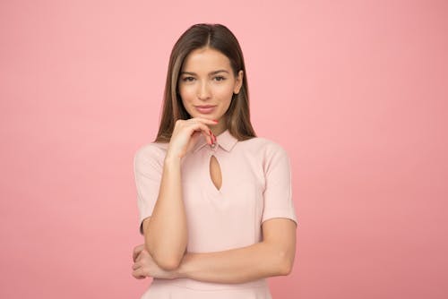 Free Woman Wearing Pink Collared Half-sleeved Top Stock Photo