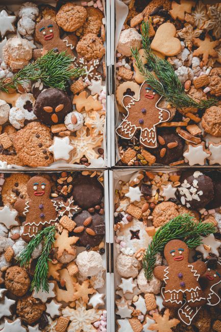 Delicious assortment of Christmas cookies featuring gingerbread men and festive decorations.