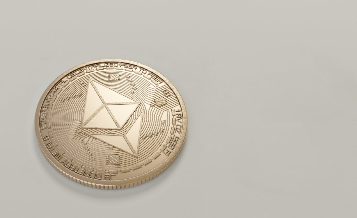 Free Round Gold-colored Ethereum Coin Stock Photo