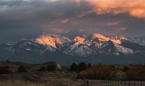 Безкоштовне стокове фото на тему «гори, Захід сонця, краєвид»