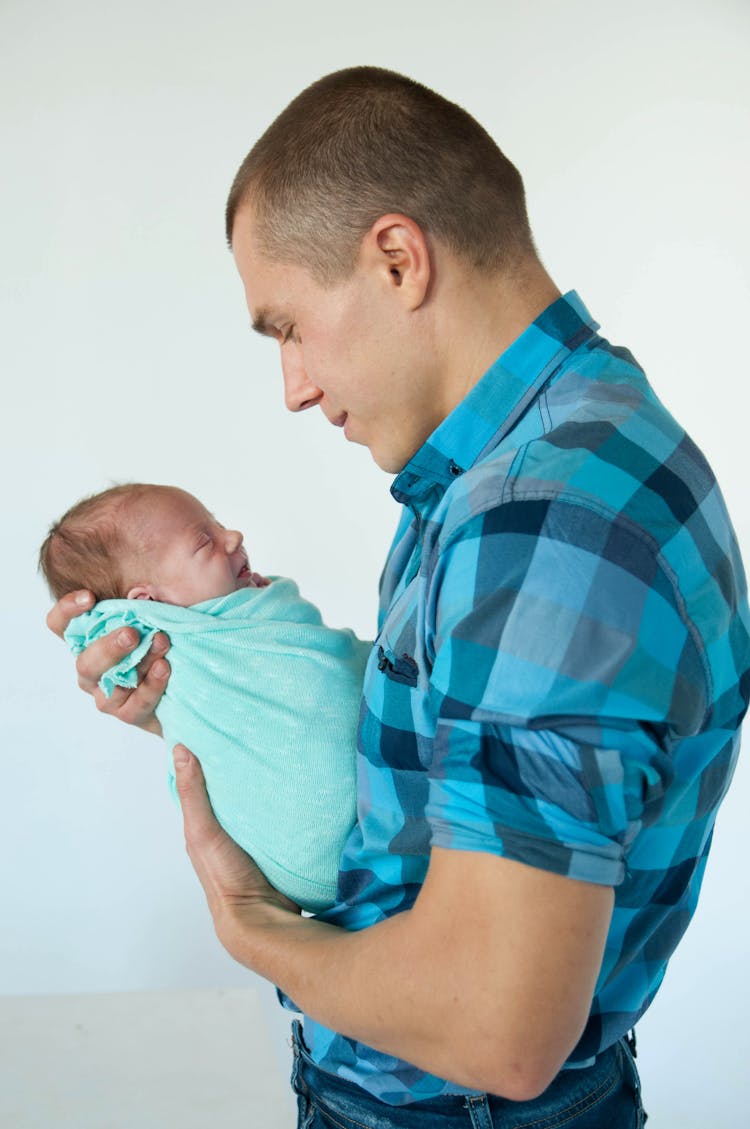 Father Holding Baby