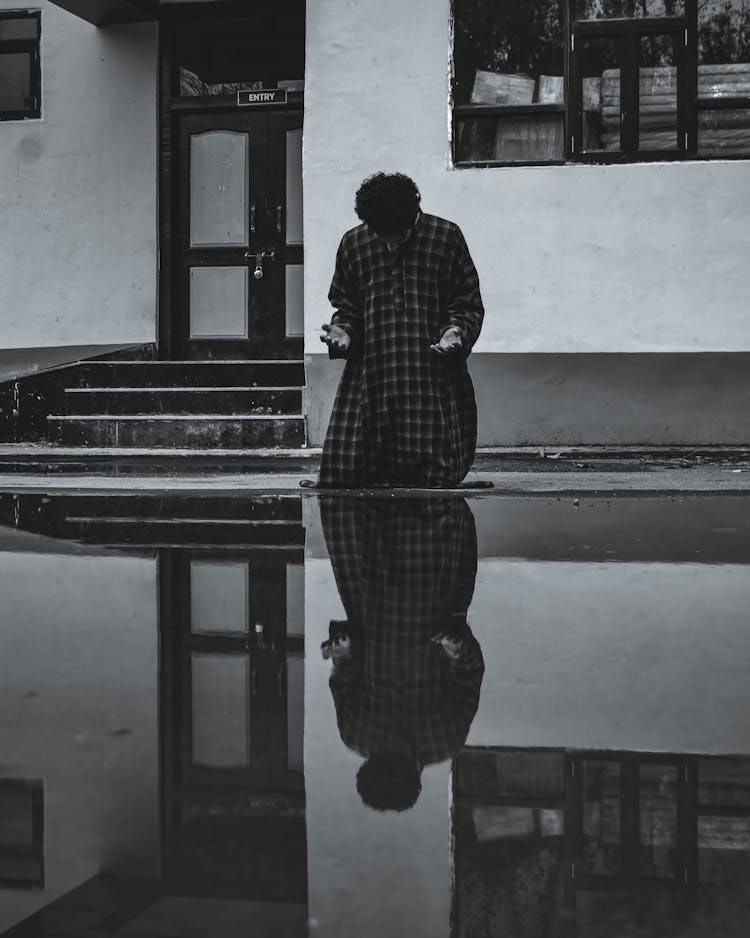 Kneeling Man Offering A Prayer