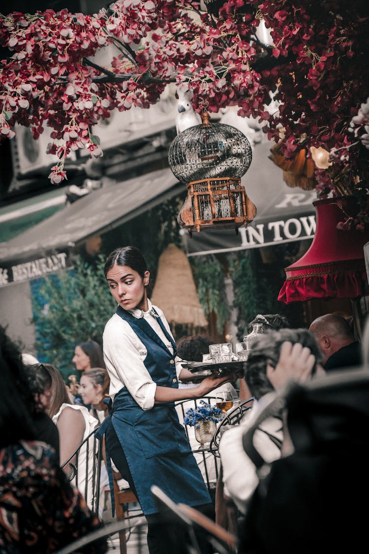 Waitress Holding A Tray 