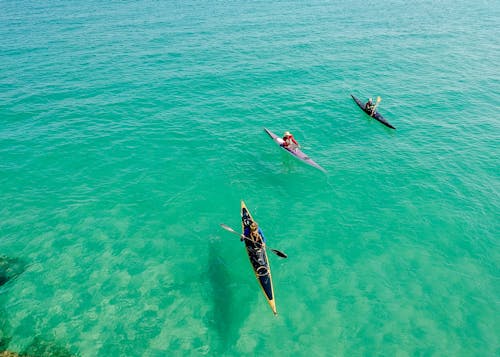 Three Yellow and Pink Kayak