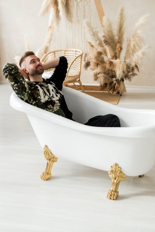 Man Sitting in the Bathtub 