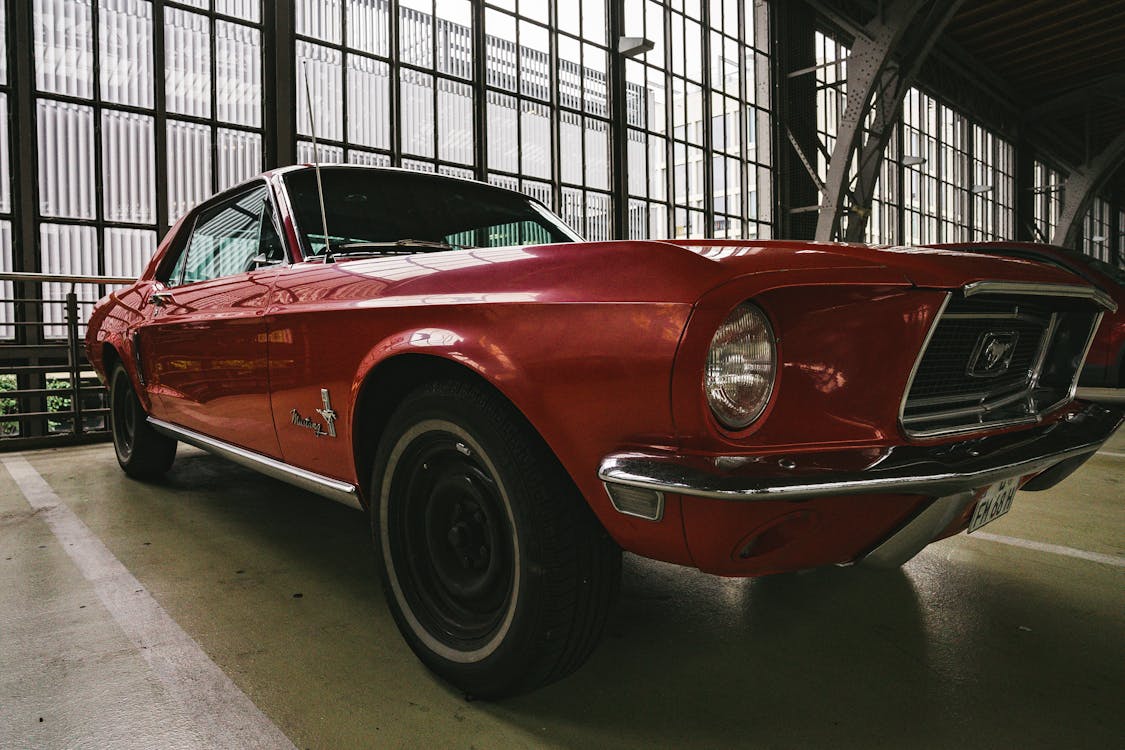 Close-Up Shot of a Red Mustang 