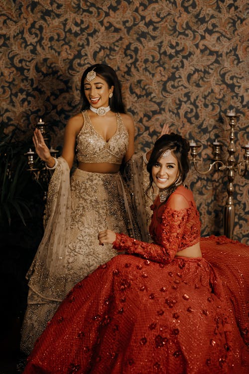 Happy Women in Traditional Hindu Dresses
