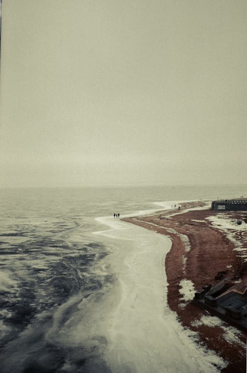 Ilmainen kuvapankkikuva tunnisteilla hiekkaranta, horisontti, horisontti veden yli