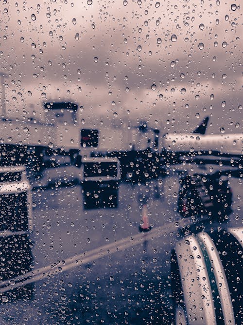 Free stock photo of after rain, airplane window, airplanes