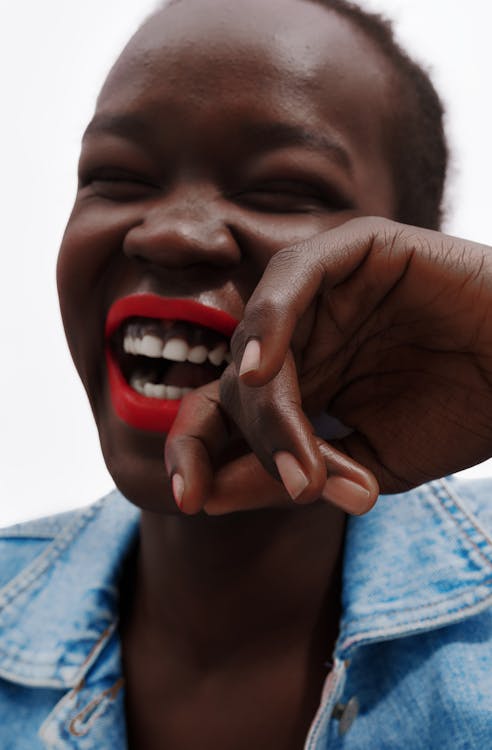 Young Woman with Red Lips Laughing