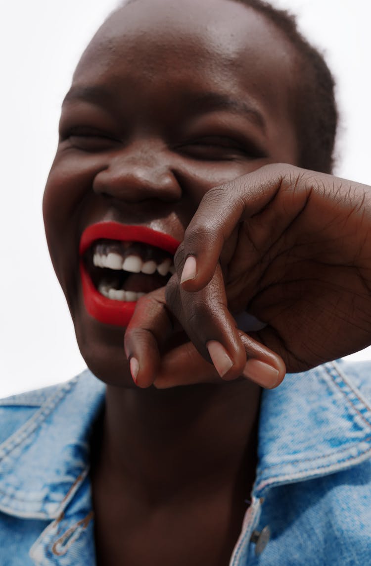 Young Woman With Red Lips Laughing