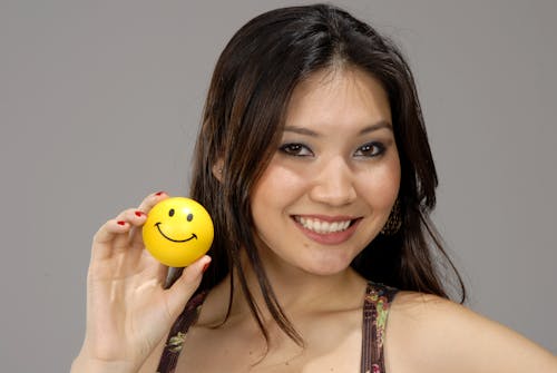 Free stock photo of asian woman, ball, brown eyes