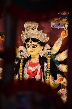 Colorful and intricate Durga idol from Durga Puja festival in Siliguri, India.