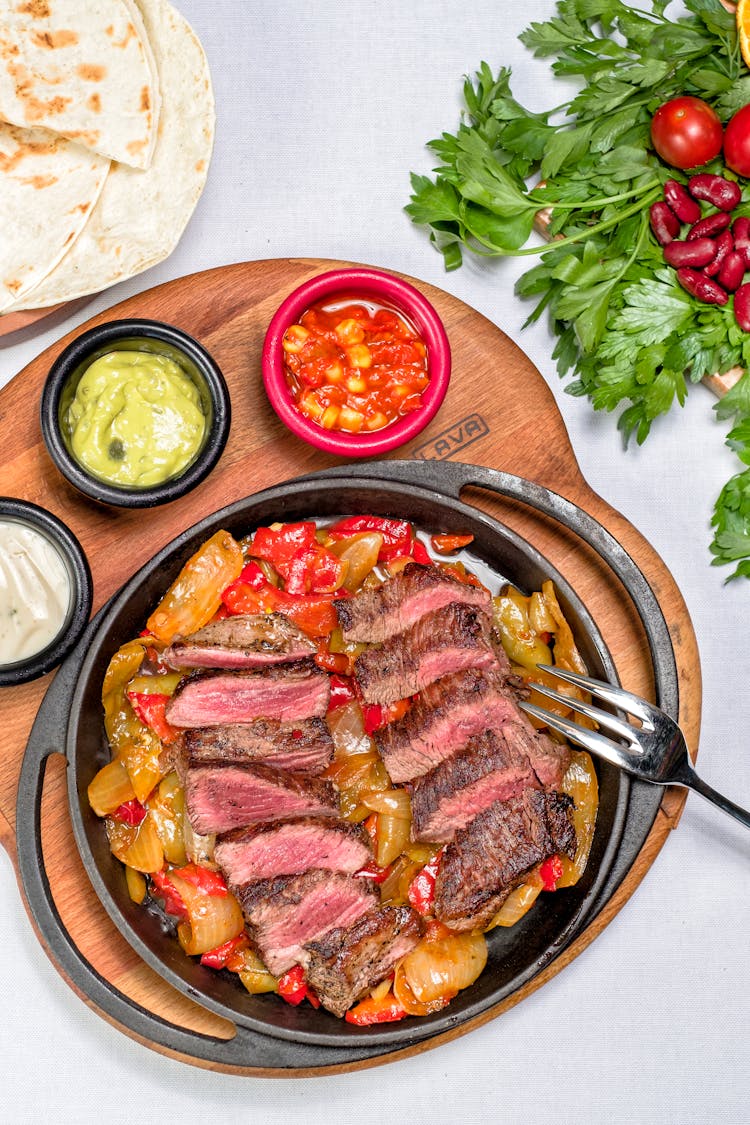 Meat Served On Frying Pan