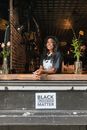 Woman at a Cafe Bar