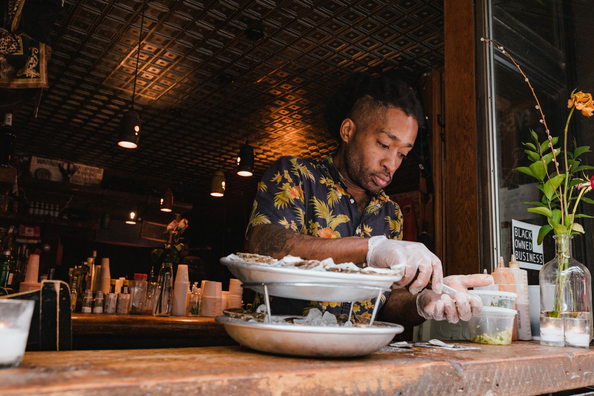 Man in Gloves Preparing Food