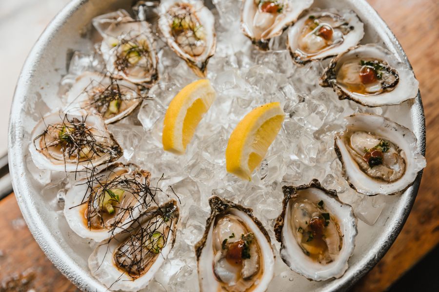 Fresh oysters on crushed ice with lemon