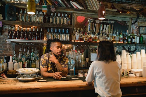 Man and Woman at Bar Counter