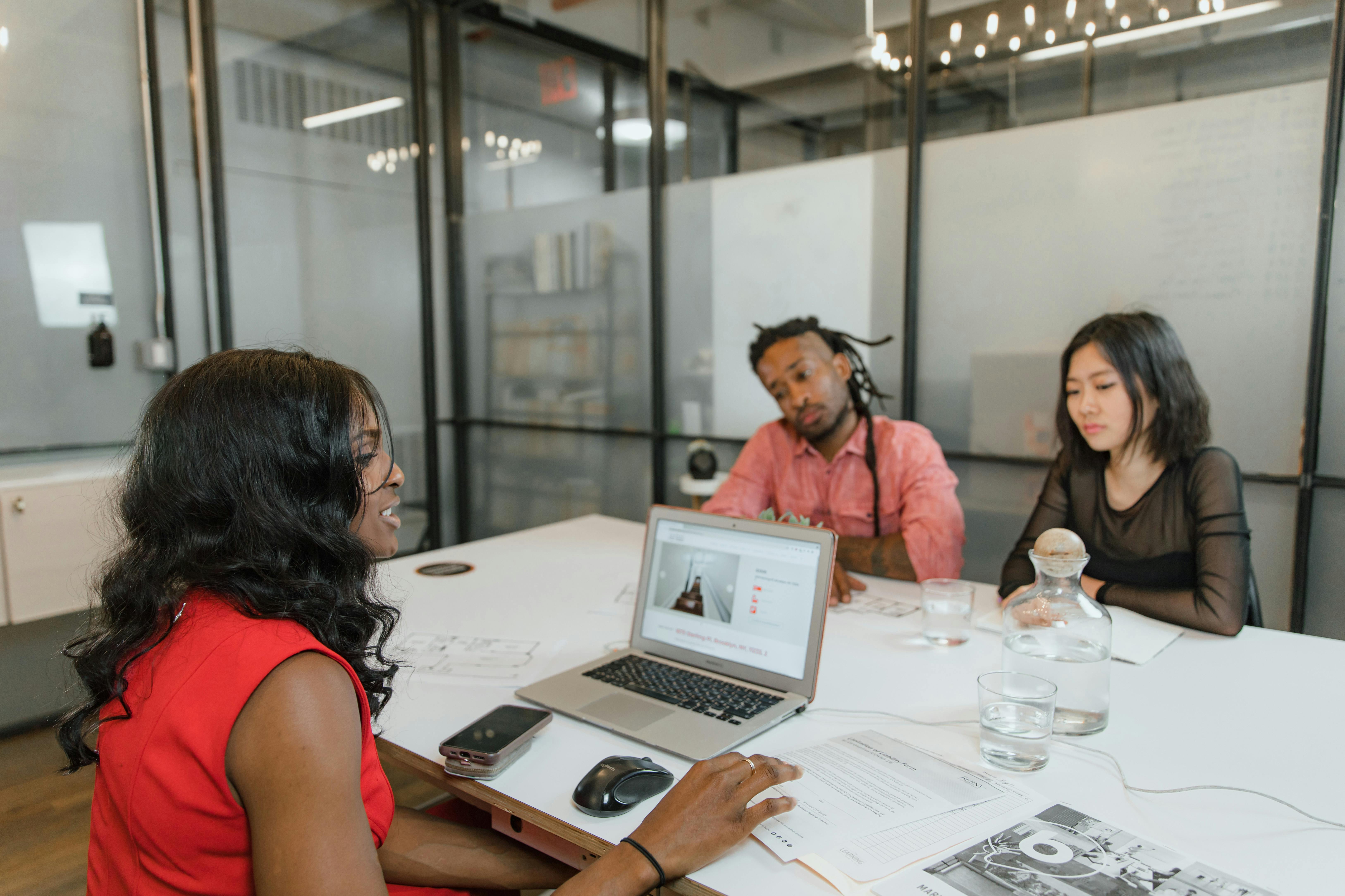 Businesspeople Having Meeting in Office