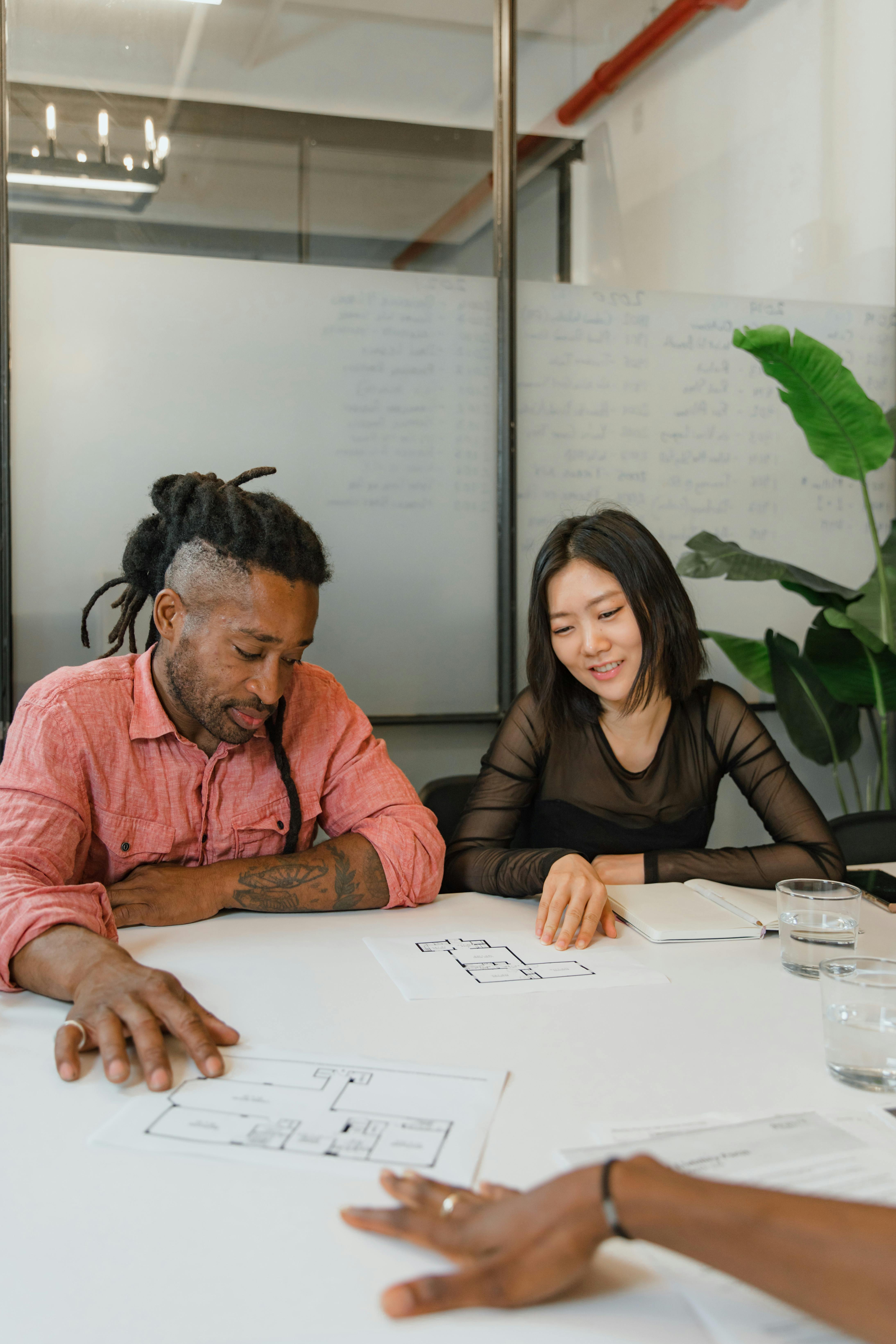 People Brainstorming in Office · Free Stock Photo