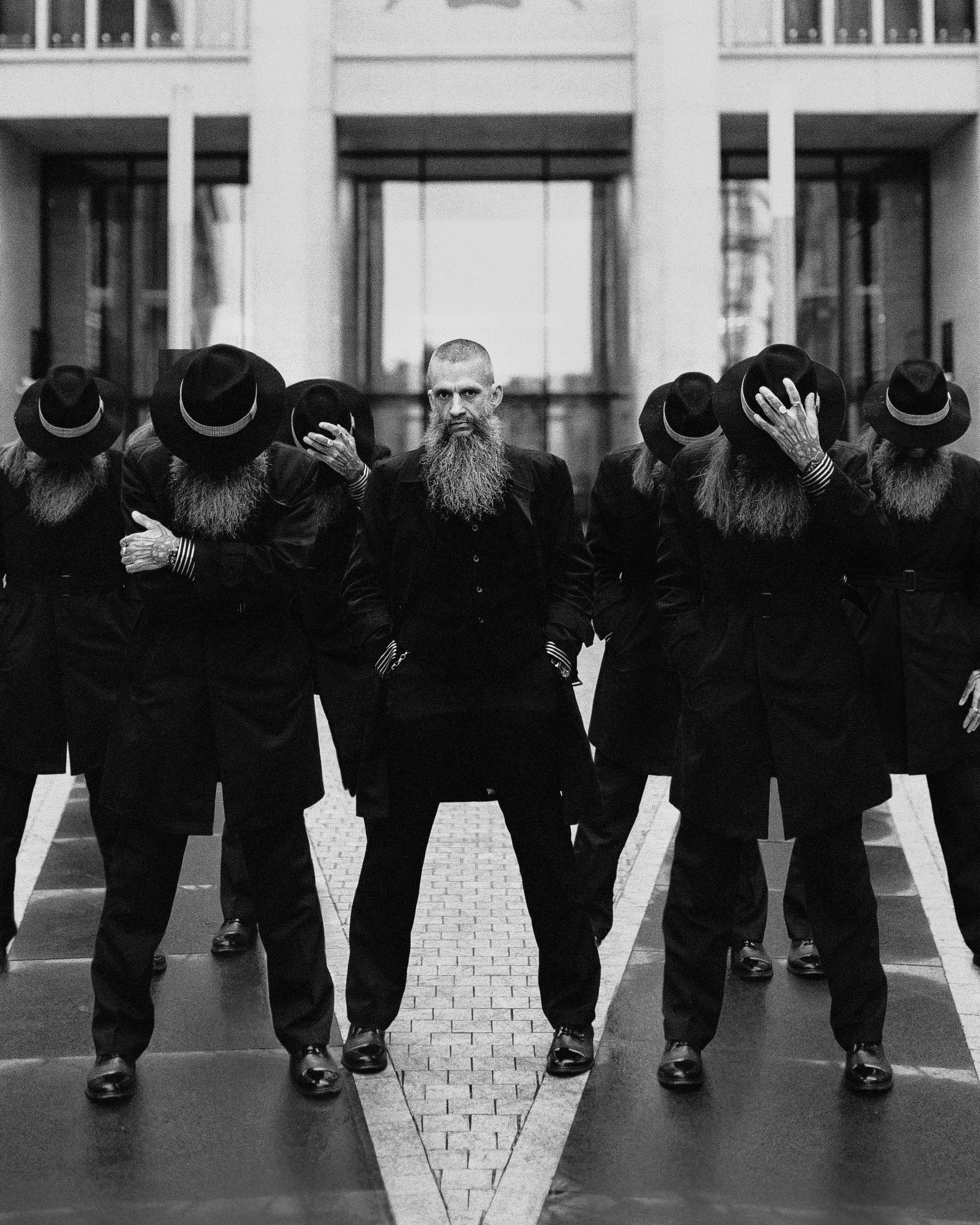 black and white photography of bearded men