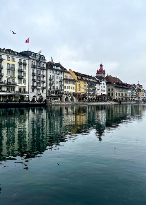 Free Beautiful waterfront view with reflections in Lucerne, Switzerland. Stock Photo