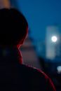 Man in Black Shirt Looking at the Light